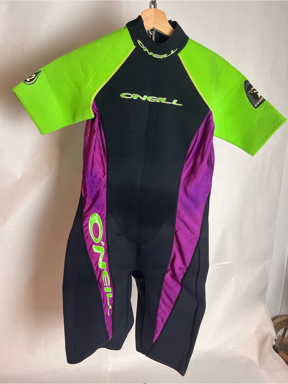 O'Neill Womenβs Short Sleeve Swim Wetsuit - Neon Green, Black & Purple